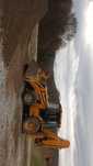 Vând buldoexcavator komatsu wb97r