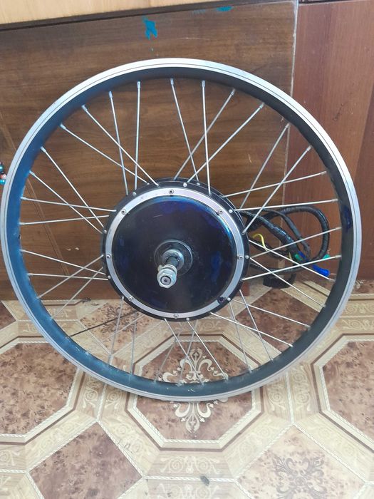 продаю электро двигатель в рабочем состоянии на 1500 ват 26 колесо