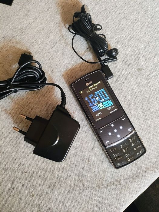 LG KF510 + accesorii originale LG ( decodat,lb română)