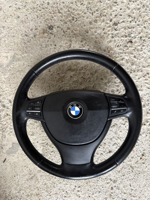 Volan f10 cu distrinic , comenzi pe volan