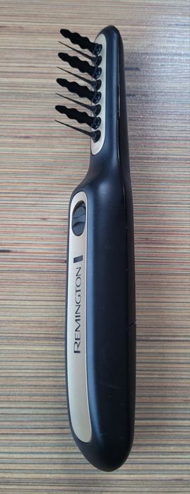 Perie electrică de descurcare a parului Remington