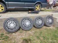 Продавам зимни гуми 215/60R16 с джанти и тасове – комплект 4 броя