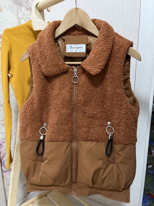 Продам жилет,состояние нового