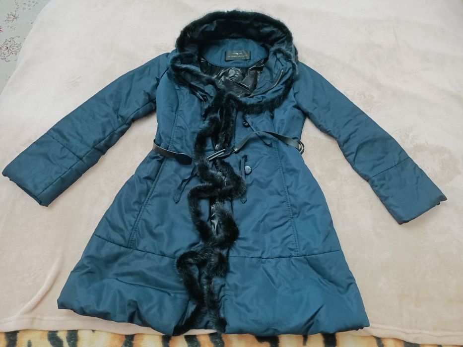 Продам пуховик женский 40р.