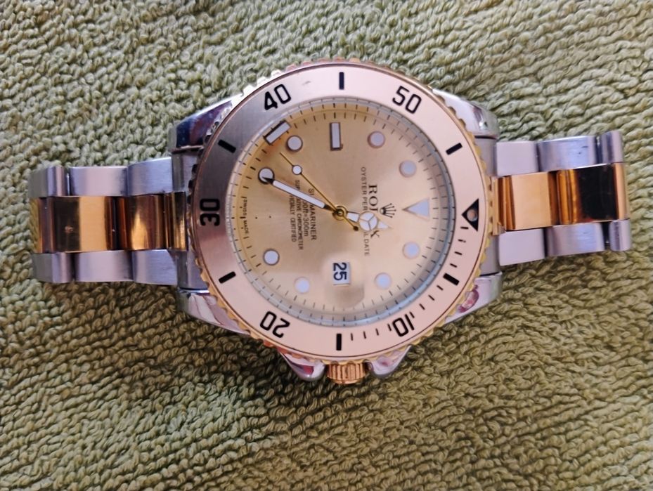 Ролекс м. часовник и м.гривна Версаче