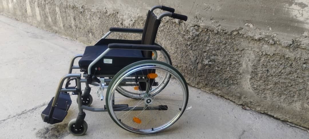 Инвалидные коляски .