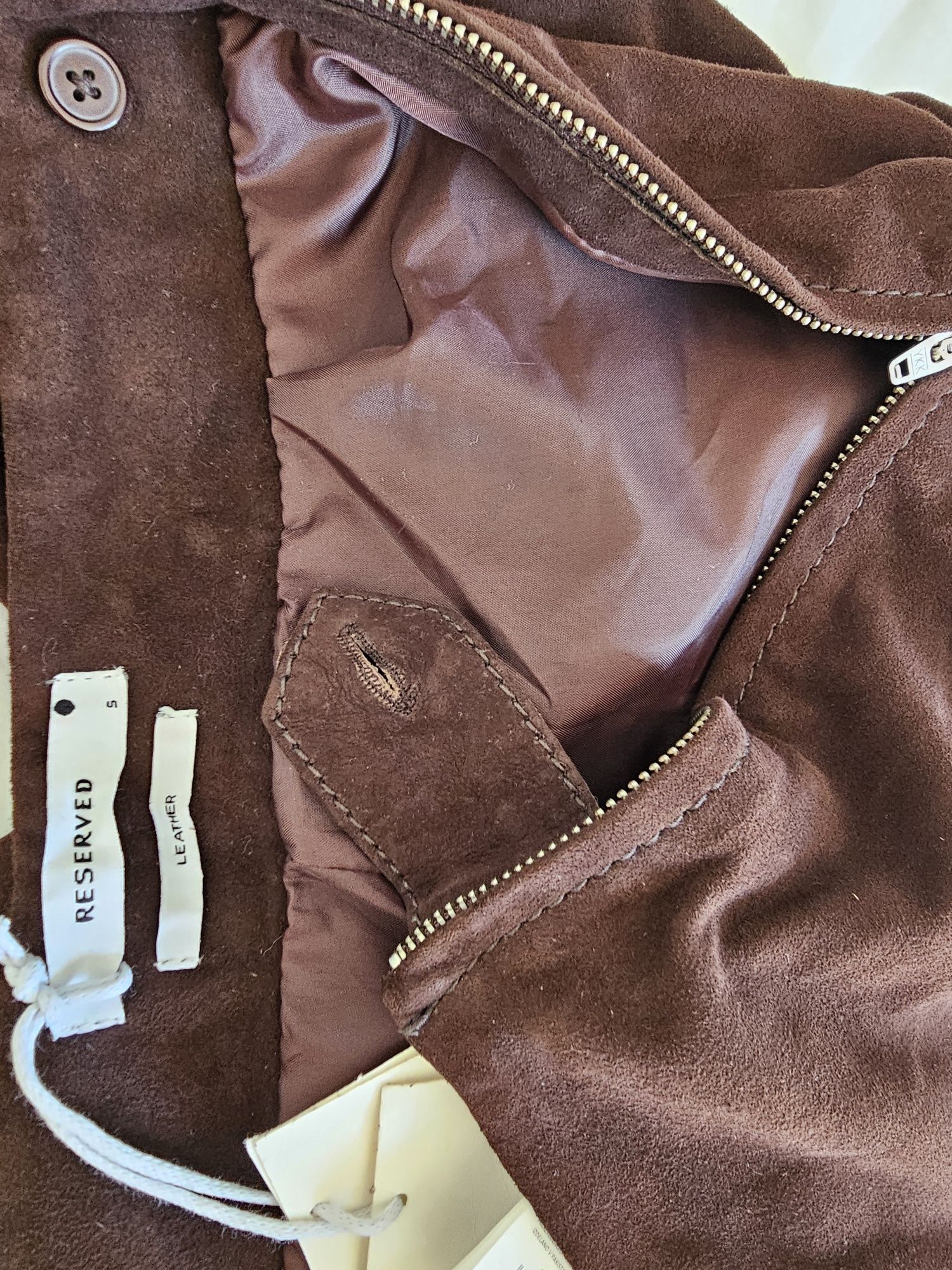 Pantaloni piele naturala intoarsa