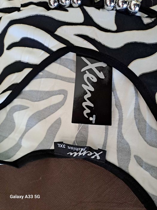 Туники за едри дами