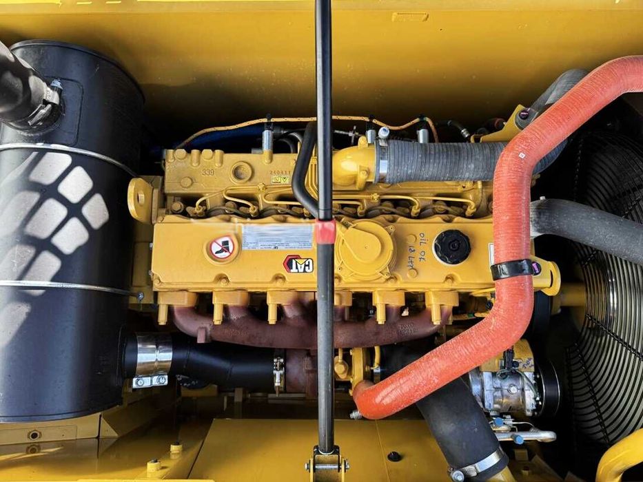 Экскаватор с длинной стрелой Caterpillar 323D3