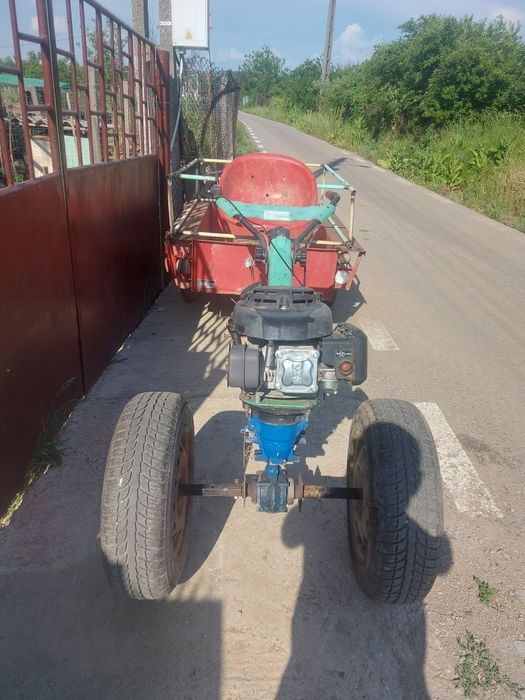 Motocultor de 7  și o remorcuta