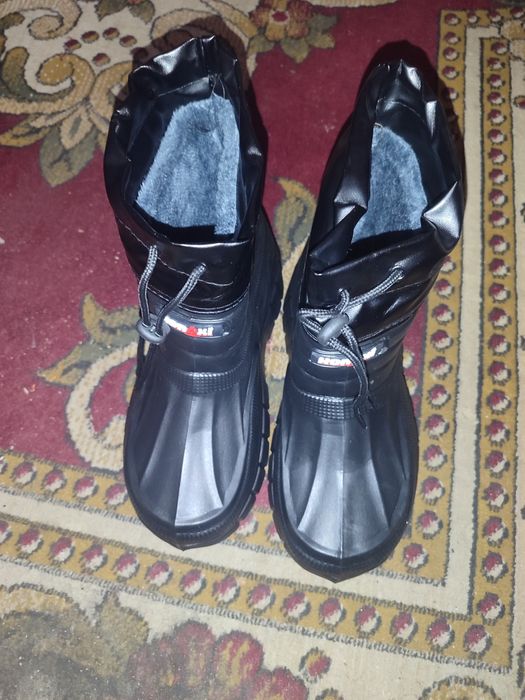 Продам мужские сапоги.