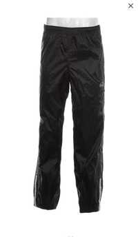 Pantaloni sport McKinley Noi, M/L. Cu fermoar si capse pe margini