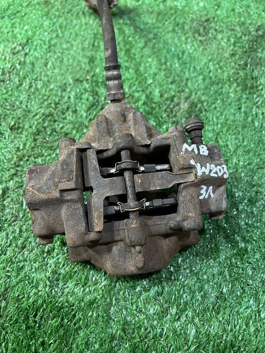 Суппорт задний левый Мерседес Мерс цешка с180 203 Mercedes w203