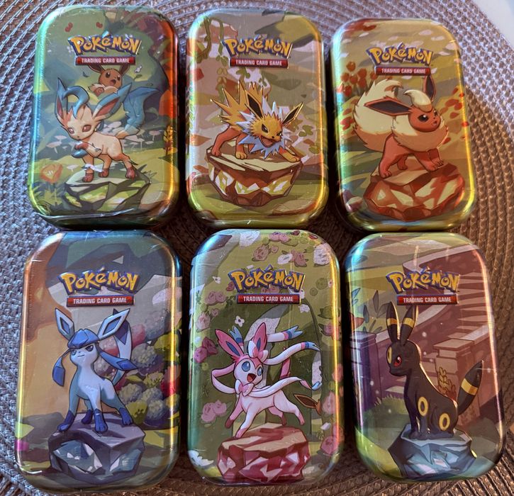 Pokemon TCG Prismatic Evolutions Tins