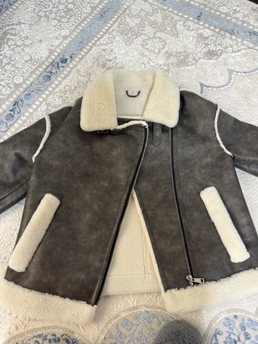 Эко кожа, дубленка, очень хорошая качества, все замоки рабочие,легкаяя