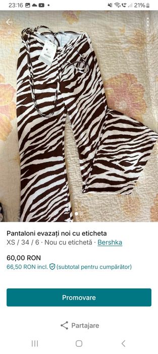 Pantaloni evazați cu eticheta