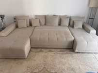 Coltar in forma de U extensibil.