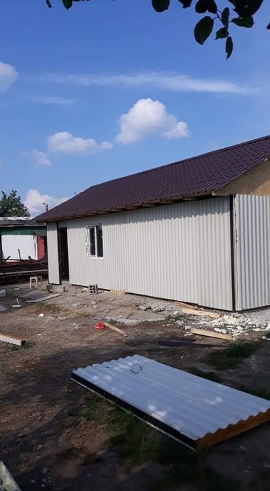 Vand containere stil casa din structura metalica