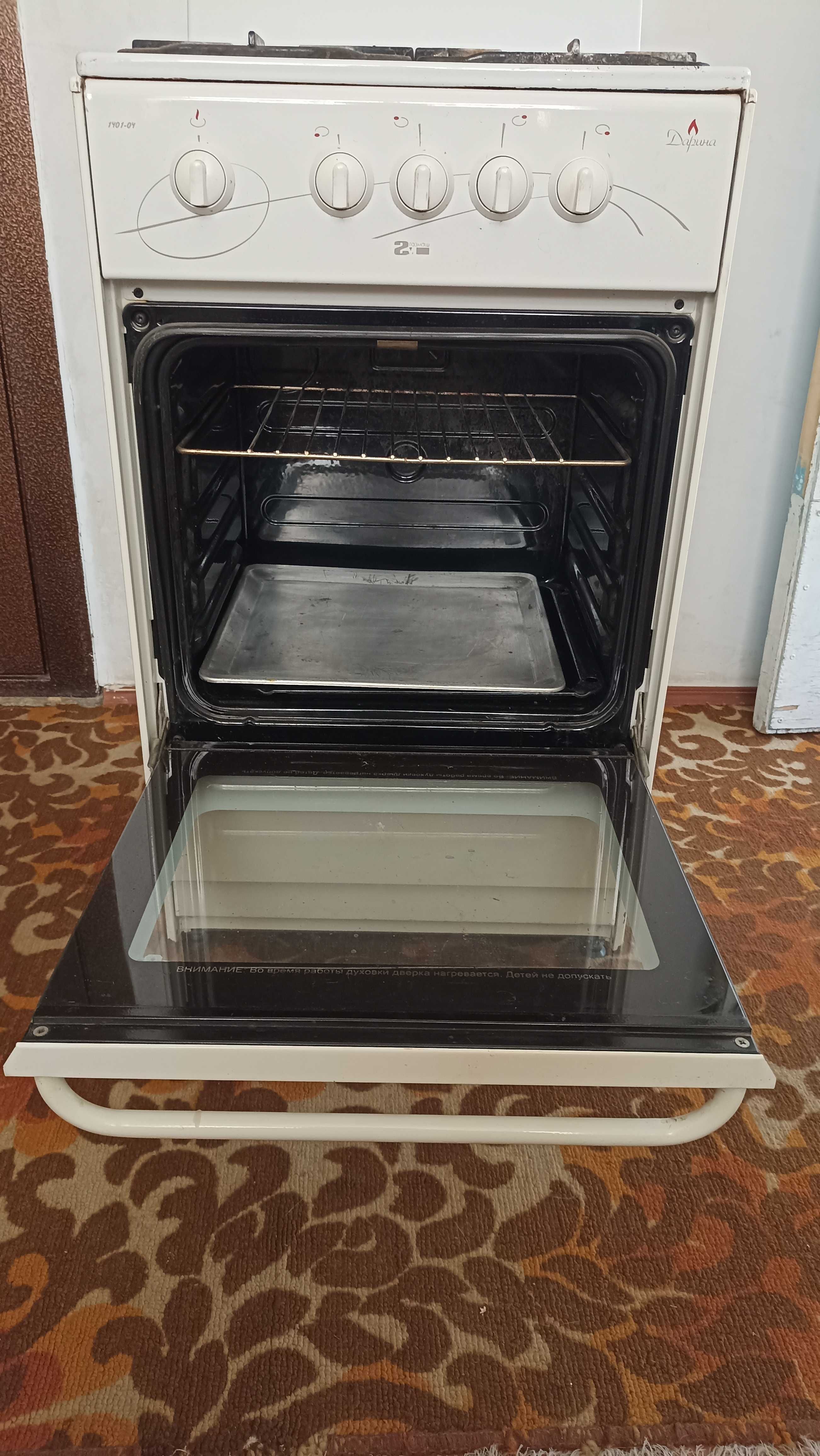 Продам бытовую газовую плиту "Дарина" четырехгорелочную .