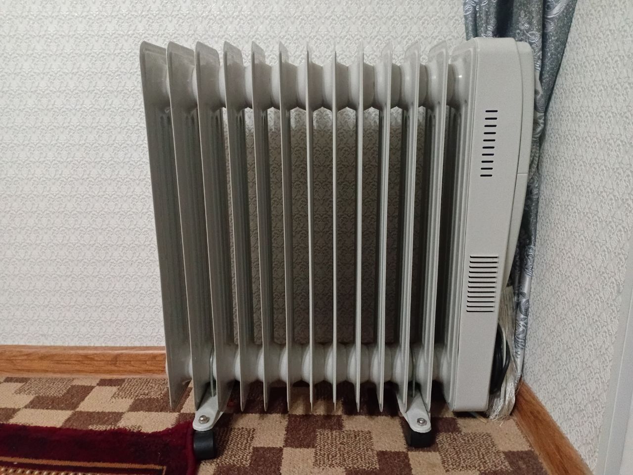 Масляный обогреватель