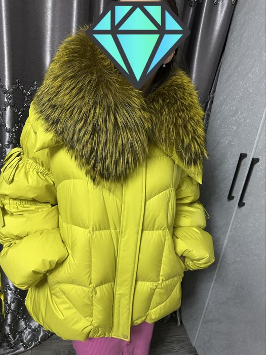 Продам пуховик новый производство Италия.