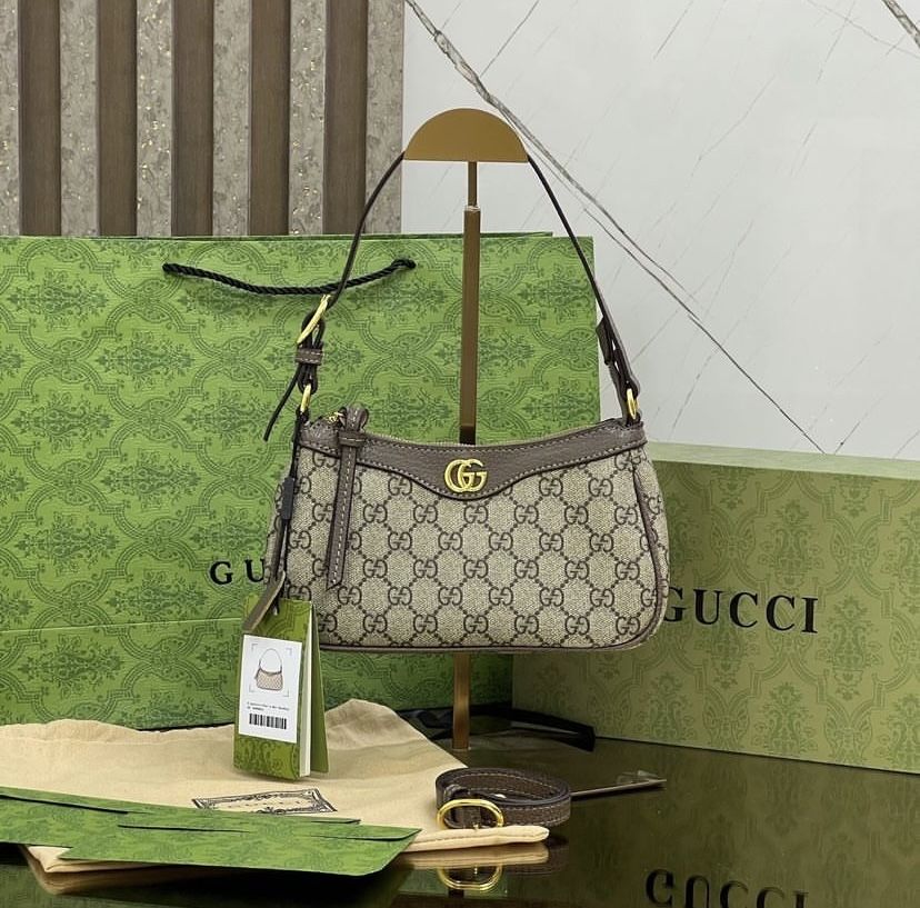 Продамновую сумку Gucci