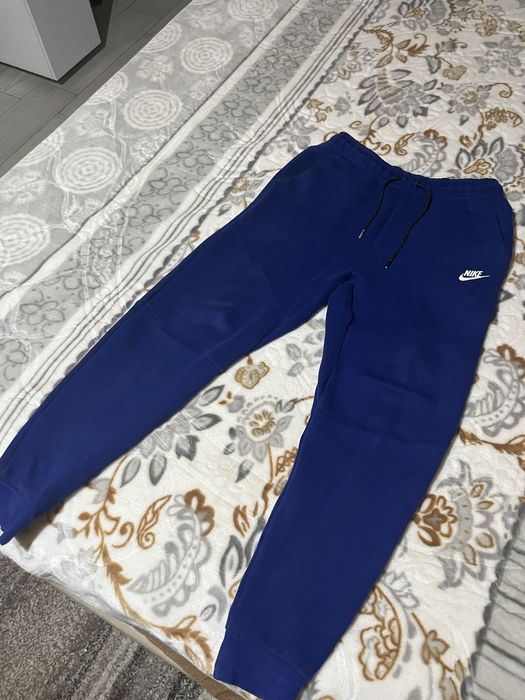 Pantaloni nike tech albastrii