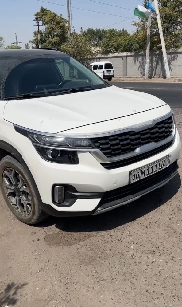 kia seltos 2021 beliy jemchug