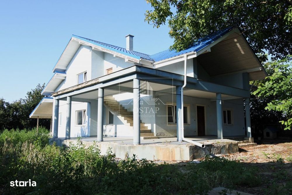 Șerbanesti - strada Siretului - vila la gri - P+M - teren 1.000 mp