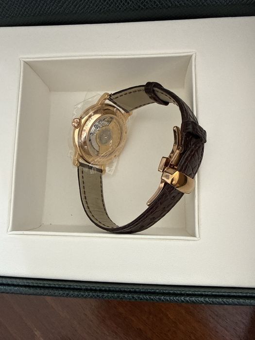 Швейцарские золотые часы