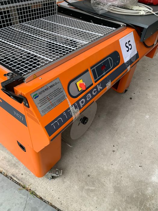 Utilaj , mașină de ambalat MINIPACK FC77 cu folie termocontractibila