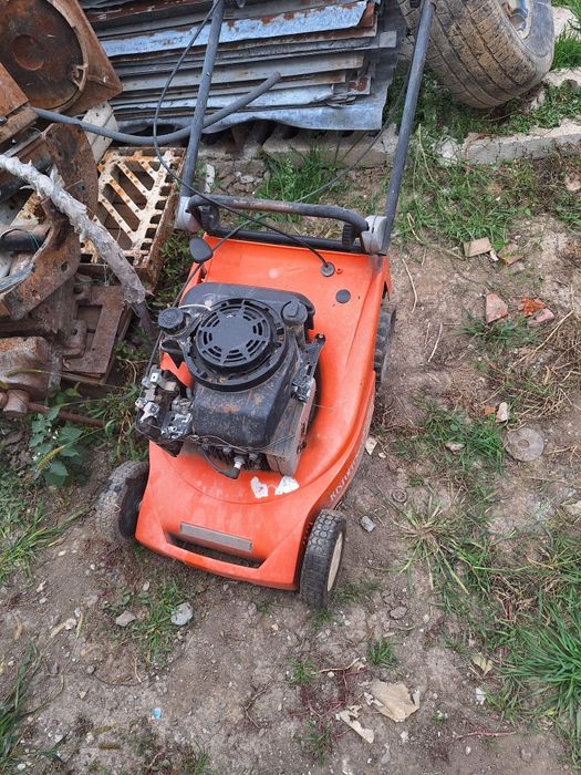 Mașini de tuns iarba și motocultor