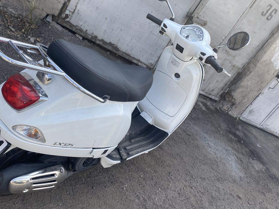 Мопед vespa lx 125