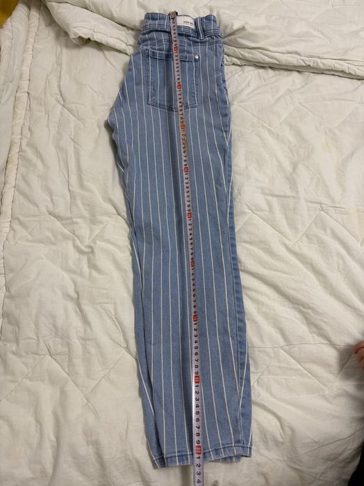 Blugi elastici de dama cu dungi