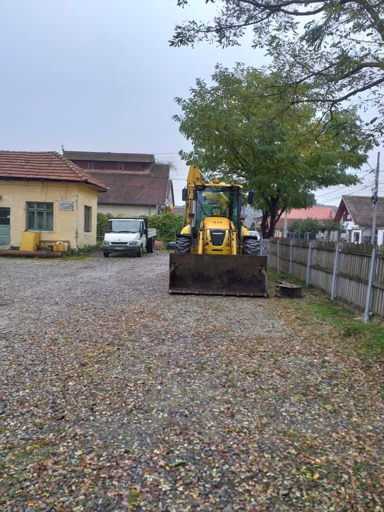 Vând buldoexcavator Komatsu