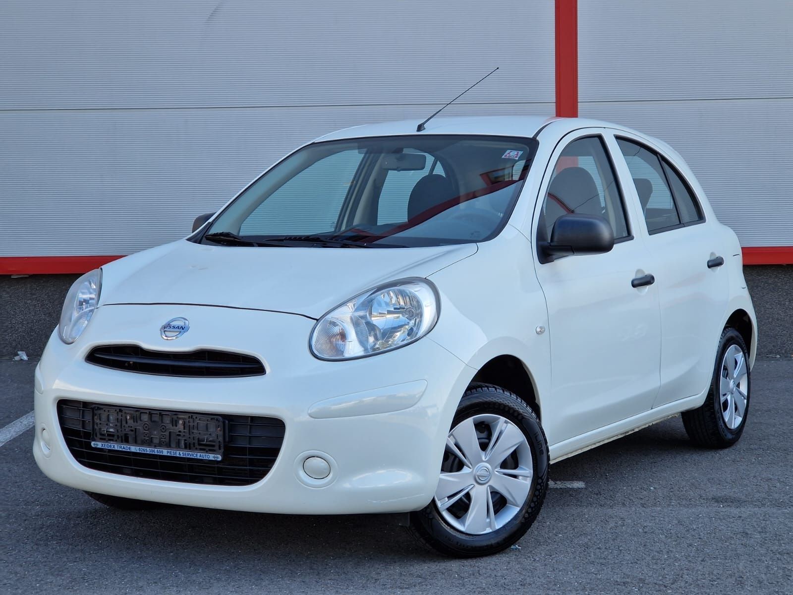 Nissan Micra~2012~1.2 Benzina~Aer conditionat~163200 Km reali~