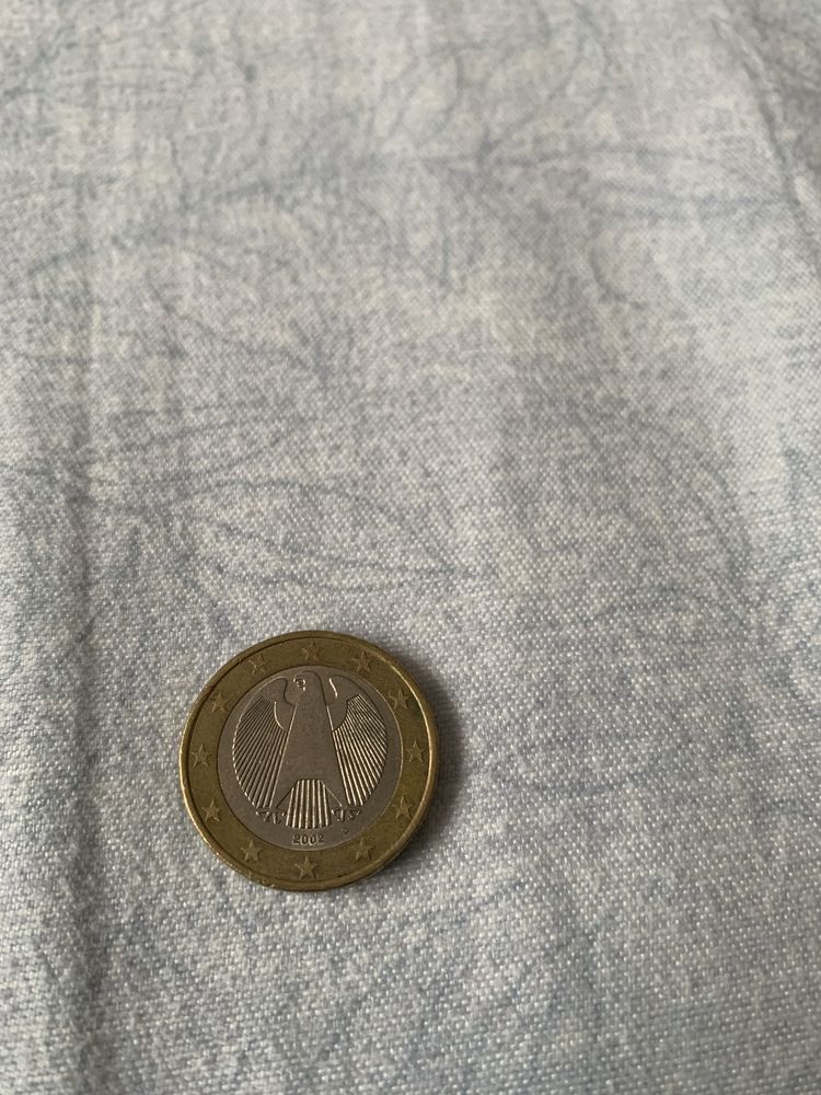 Vand moneda de un euro din anu 2002 adusa din grecia