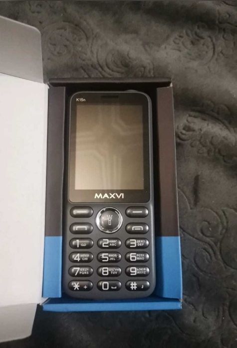 Телефон кнопочный с камерой