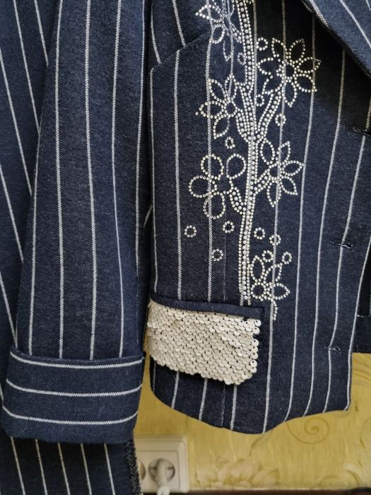 Женские одежды в отличном состоянии