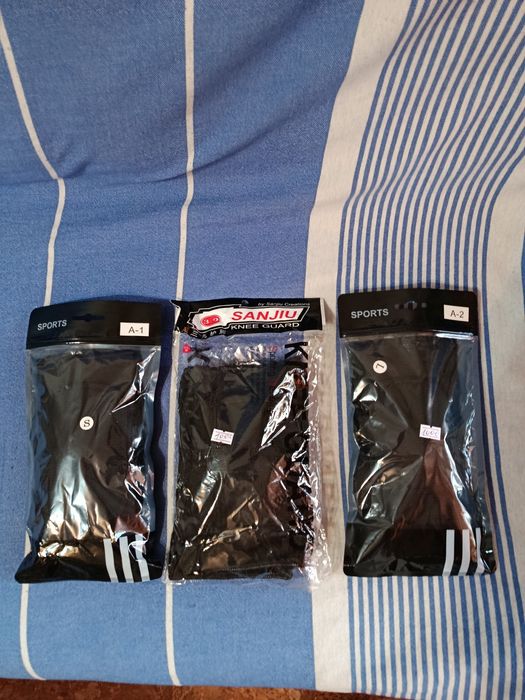 Продам новые наколенники черные