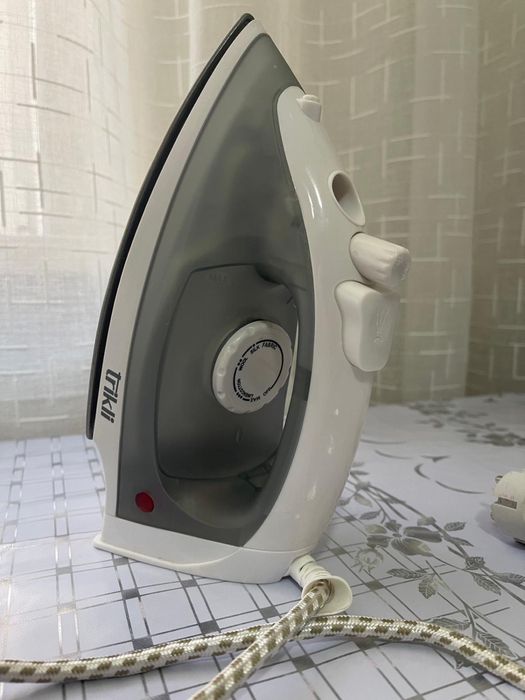Утюг марки Trikli