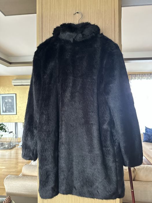 Тъмнокафяво палто астраган на Мелини