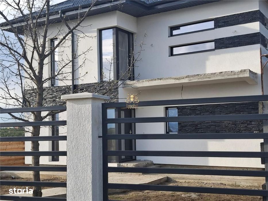 Casa eleganta 4 camere cu 500mp teren.Bucium Visani.