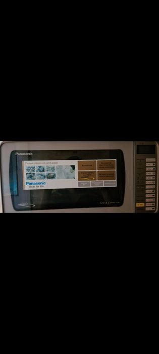 Микроволновая печь Panasonic отличное состояние, новая мерная кружка.
