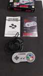 Maneta controller snes in cutie cu manual stare buna super nintendo