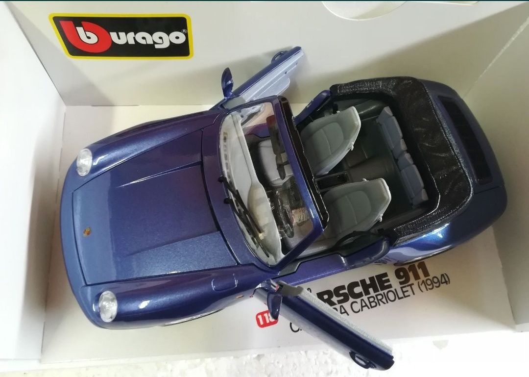 Porsche Carrera Cabriolet blue bburago 1 18 
Scara 1:18
Bburago

Pozel