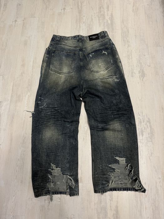 Balenciaga mud destroyed jeans
