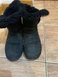 Cosme UGG firma