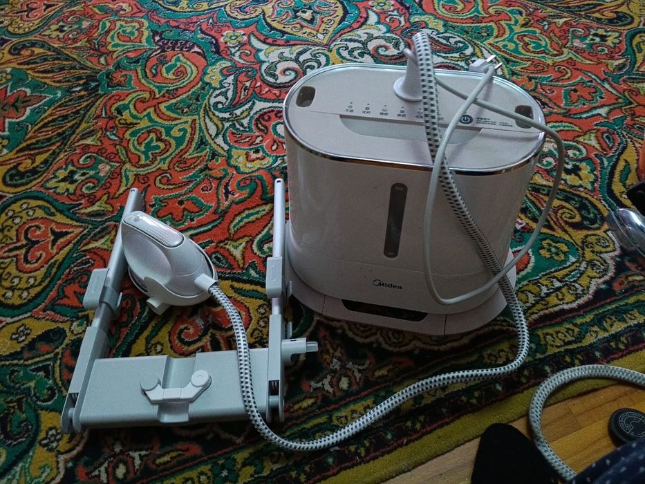 Паровой утюг водяной