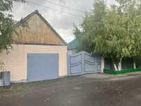 Частный дом с времянкой